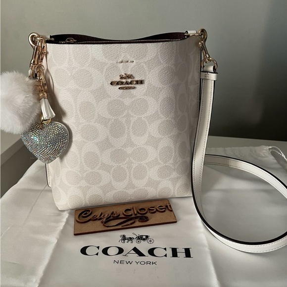 Coach Handbags - Coach White Crossbody Bag with Gold Accents